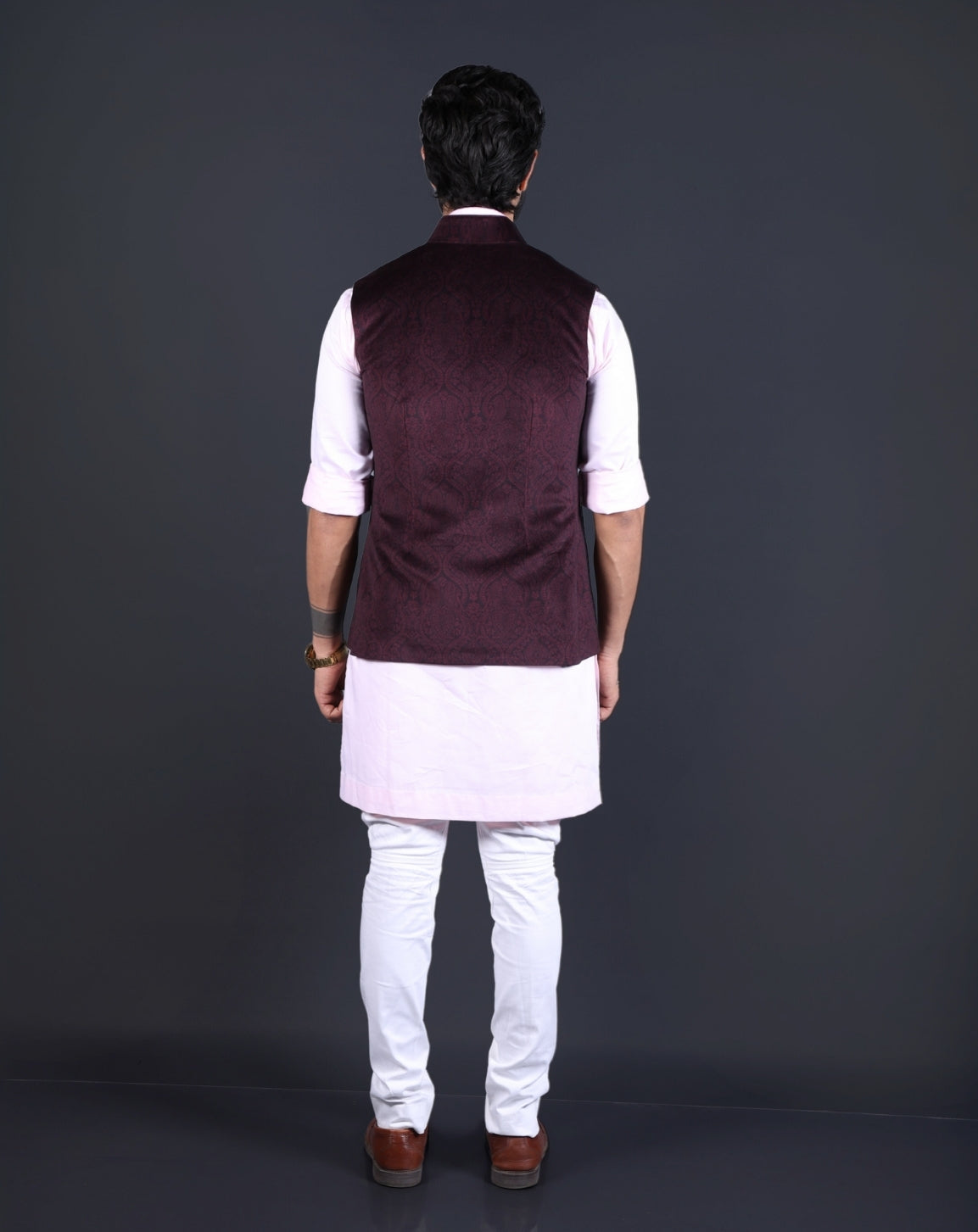 Back view of a tailored wine-colored Nehru jacket for men
