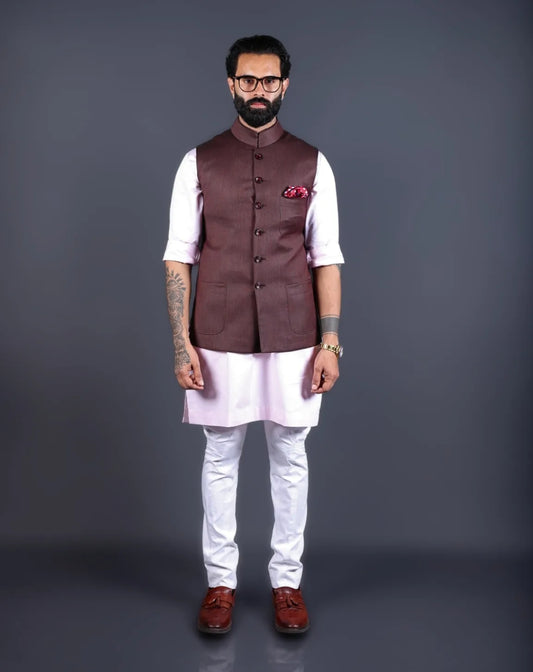 Model wearing a brown textured Nehru jacket for men with a pink kurta