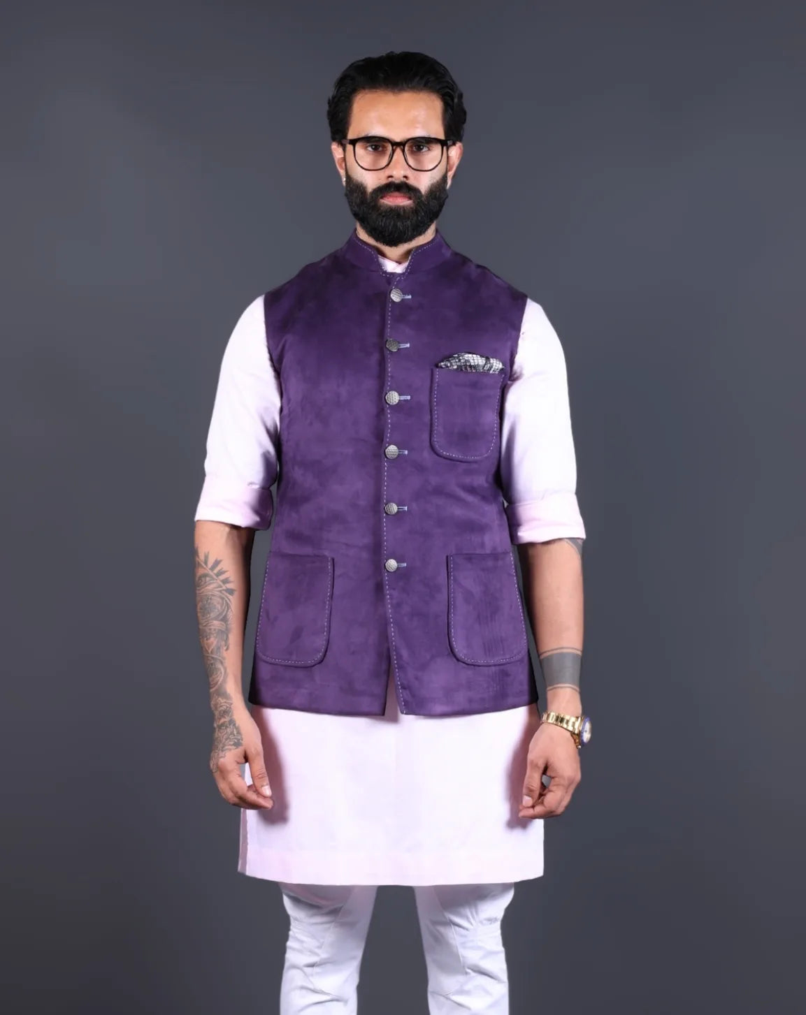 Men's ethnic outfit featuring a purple suede Nehru jacket and pink kurta