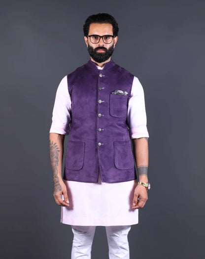 Men's ethnic outfit featuring a purple suede Nehru jacket and pink kurta