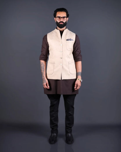 Front view of a beige Jacquard Nehru jacket for men with a pocket square