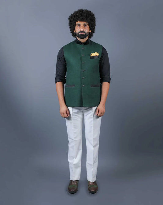 Front view of a textured forest green Nehru jacket for men